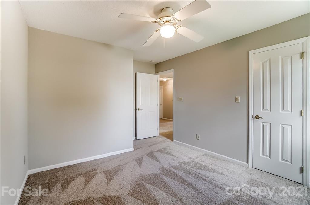 10101 Deer Spring Lane Charlotte, NC 28210 - Photo 33 of 45 a view of a big room with closet and ceiling fan