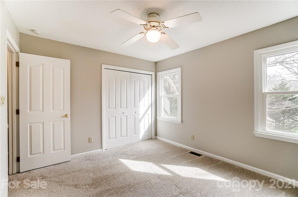 10101 Deer Spring Lane Charlotte, NC 28210 - Photo 34 of 45 a view of an empty room with a window