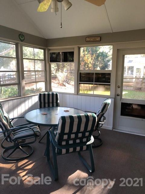 10101 Deer Spring Lane Charlotte, NC 28210 - Photo 39 of 45 a view of a dining room with furniture window and outside view