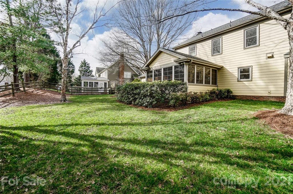 10101 Deer Spring Lane Charlotte, NC 28210 - Photo 43 of 45 a front view of a house with garden