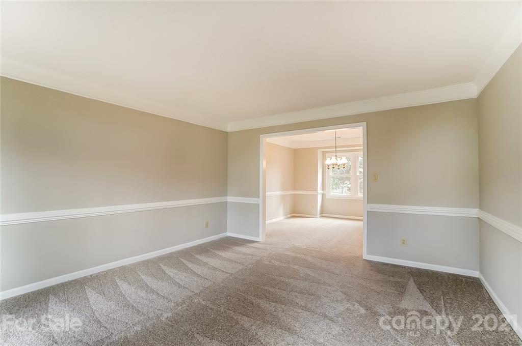 10101 Deer Spring Lane Charlotte, NC 28210 - Photo 7 of 45 a view of an empty room with a window