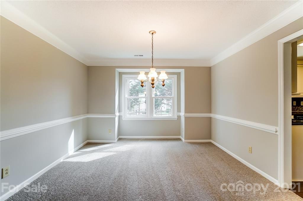10101 Deer Spring Lane Charlotte, NC 28210 - Photo 9 of 45 a view of an empty room with window