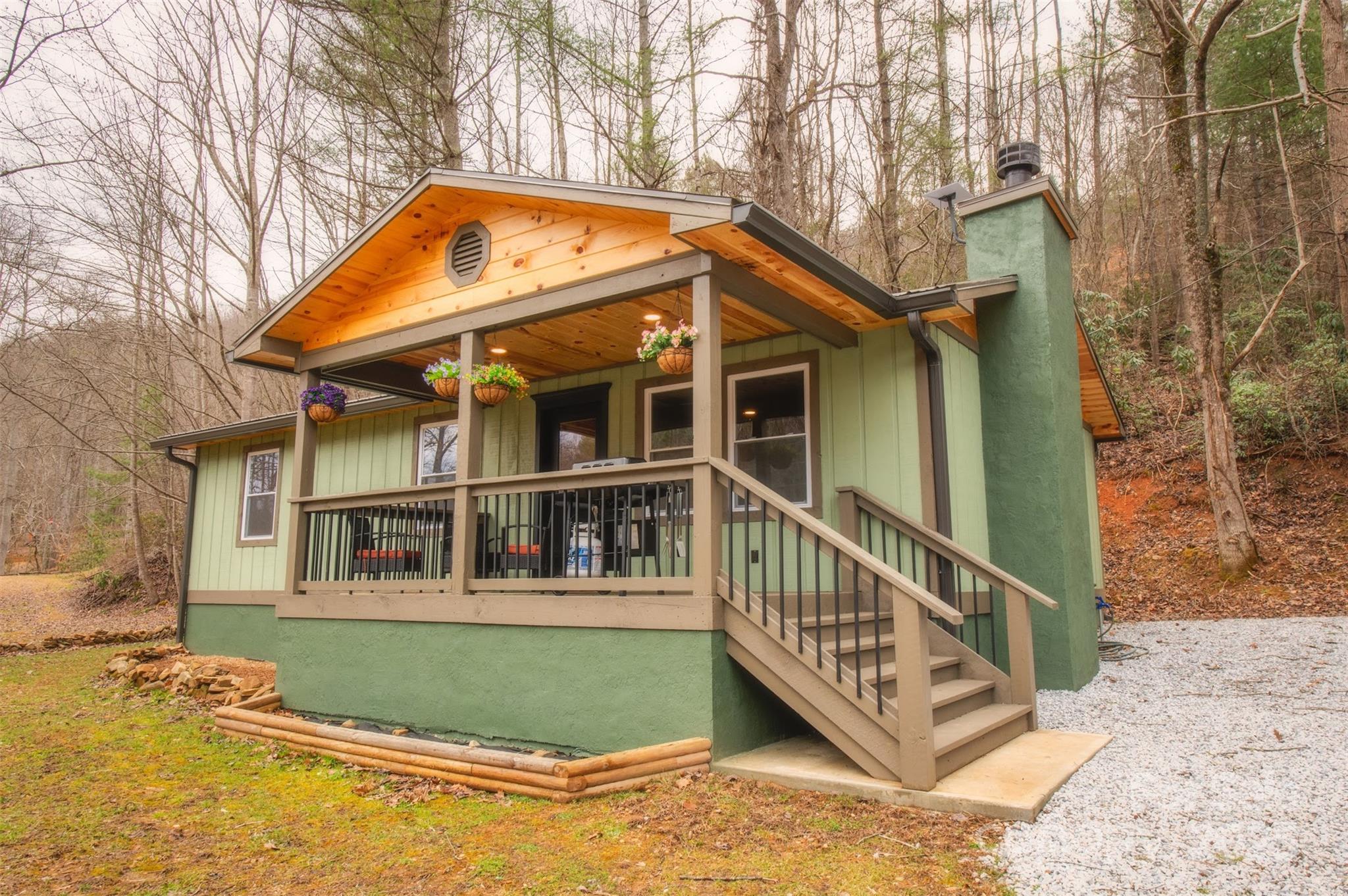 23 Honeysuckle Ridge Almond, NC 28702 - Photo 1 of 21 a front view of a house with a yard
