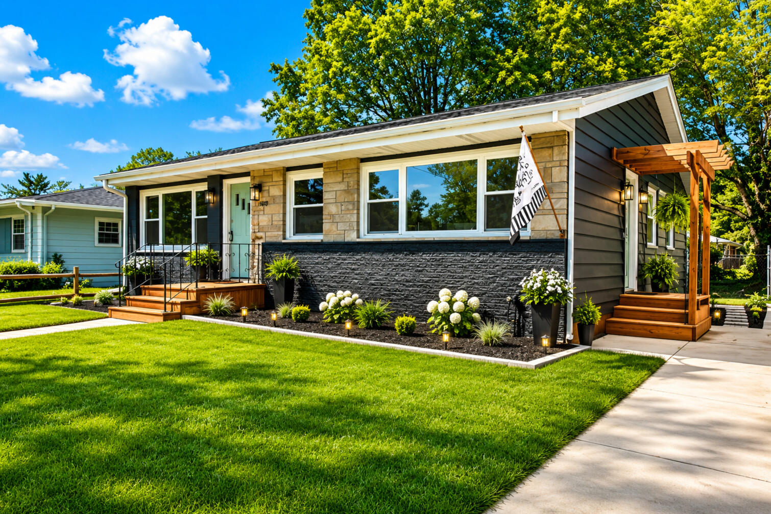 a view of a house with a yard porch and sitting area