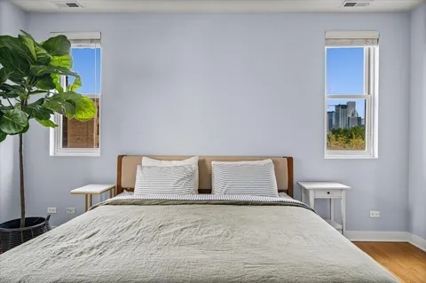 a bathroom with a double vanity sink mirror and double
