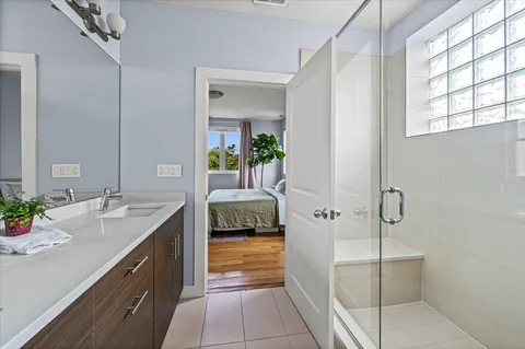 a view of a balcony with sitting area