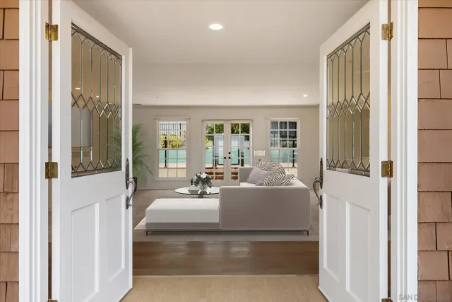 a kitchen with stove a sink and cabinets