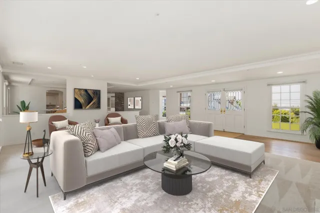 a living room with furniture and a couch