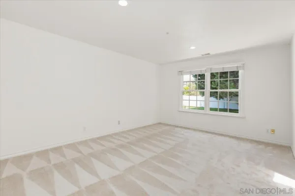a bathroom with a shower and a toilet