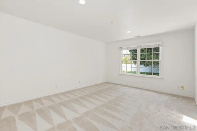 a bathroom with a shower and a toilet