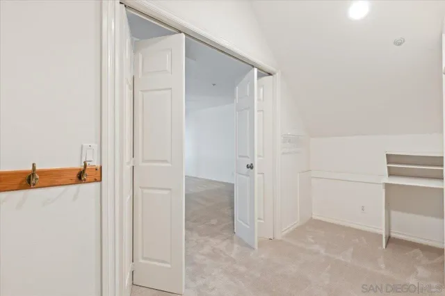 a bathroom with a shower and toilet