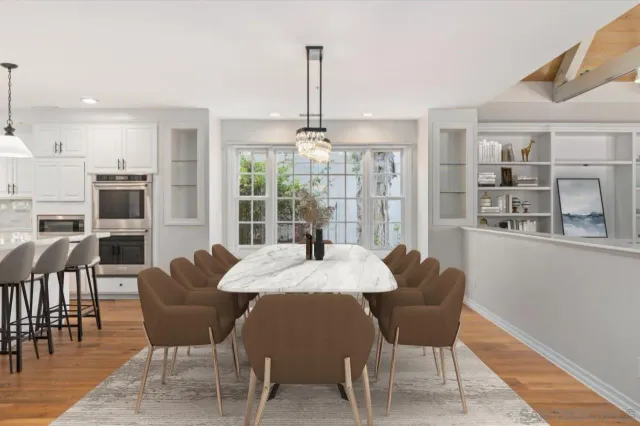 a view of a dining room with furniture window and wooden floor