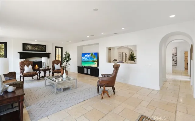 a large kitchen with a table and chairs