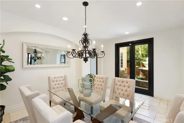 a kitchen with granite countertop a stove and a microwave
