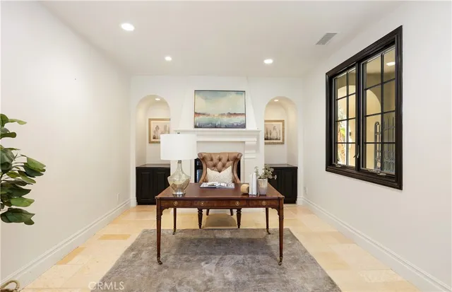 a room with a window and a chair