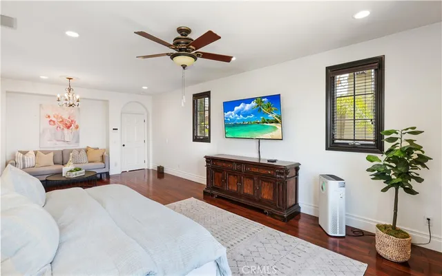 a spacious bathroom with a sink a large mirror and a bathtub
