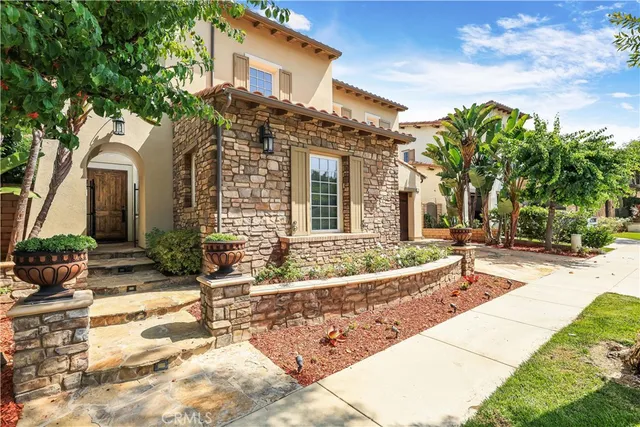 a front view of a house with a patio