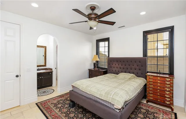 a view of a house with outdoor seating