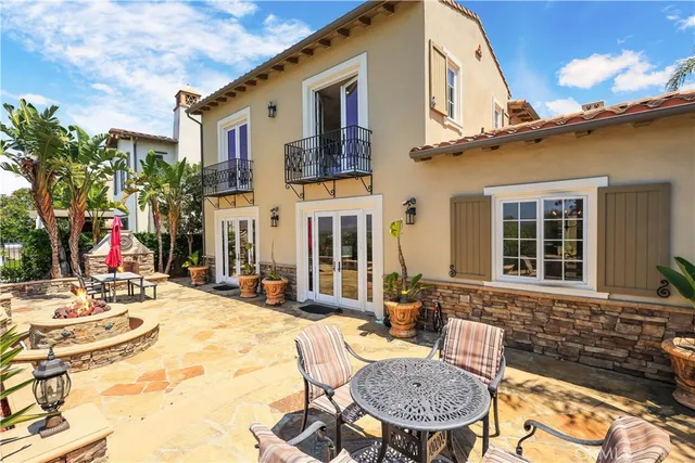 a view of a chairs and table in the patio