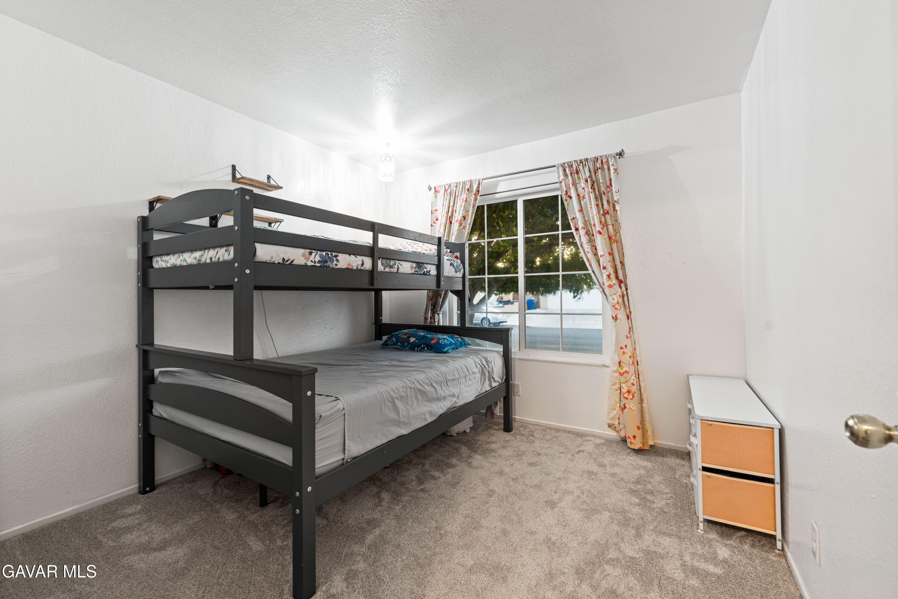 3418 Rodney Street Rosamond, CA 93560 - Photo 21 of 35 a bedroom with bunk bed