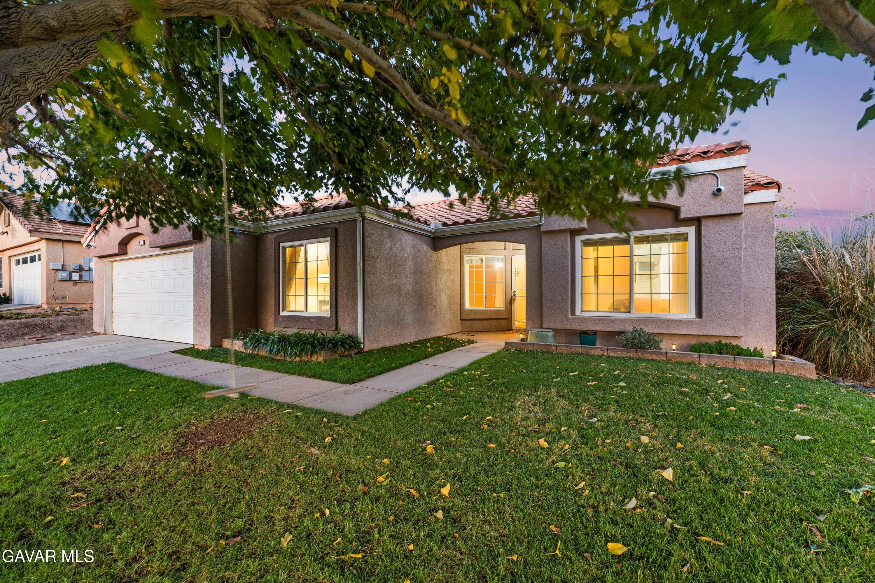 3418 Rodney Street Rosamond, CA 93560 - Photo 3 of 35 a view of a house with backyard and garden