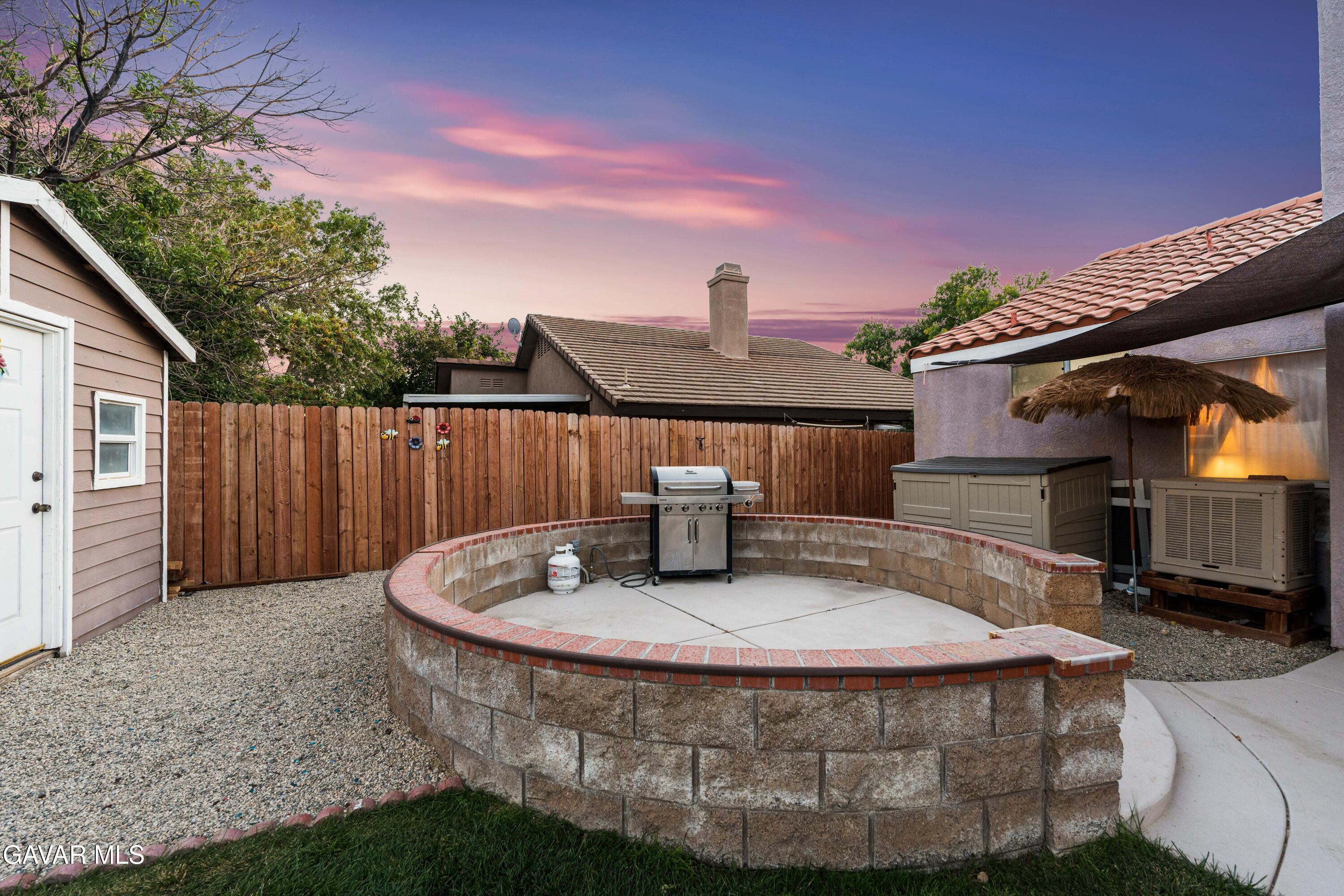 3418 Rodney Street Rosamond, CA 93560 - Photo 32 of 35 a view of a chair and tables in the patio
