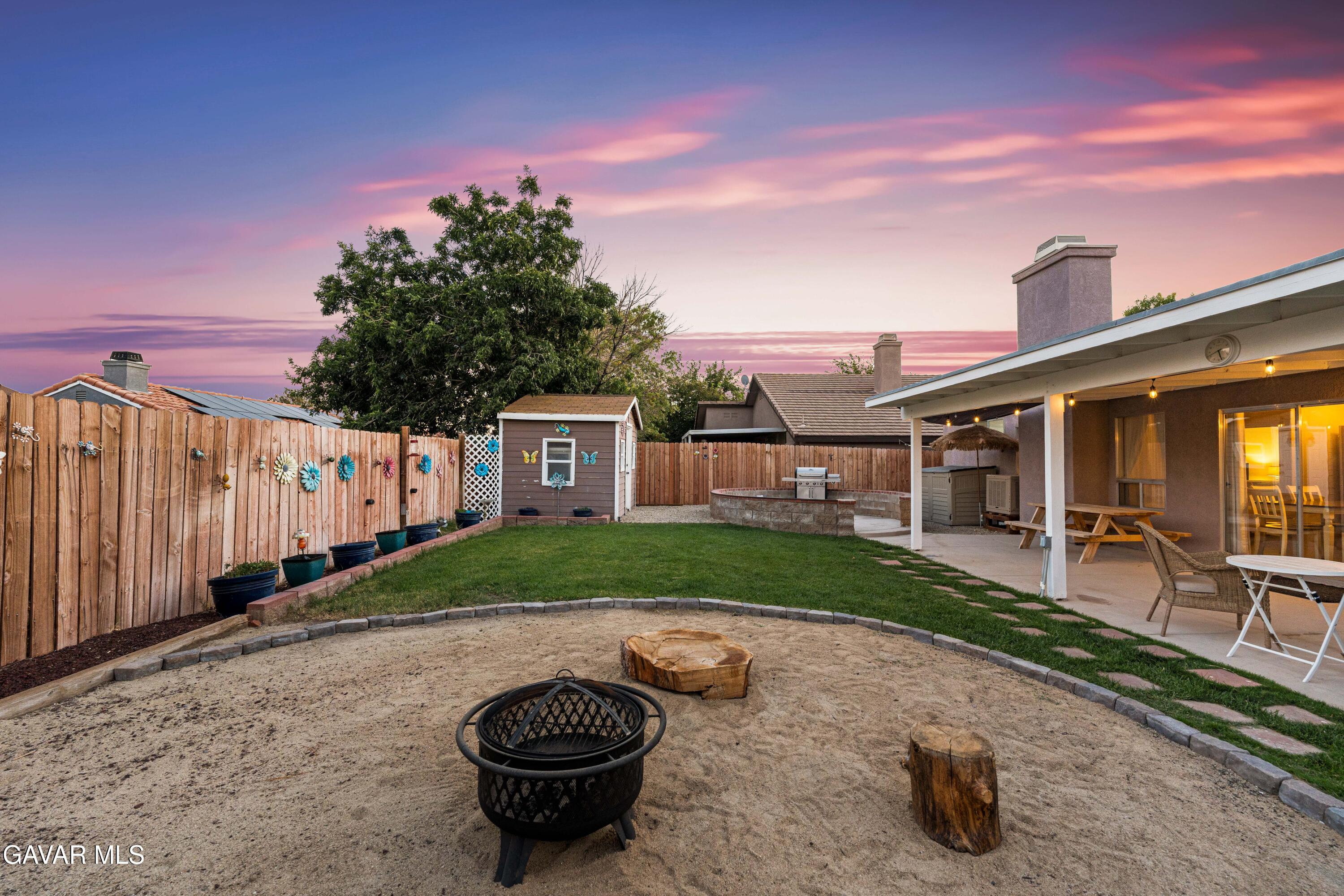 3418 Rodney Street Rosamond, CA 93560 - Photo 34 of 35 a view of a back yard of the house