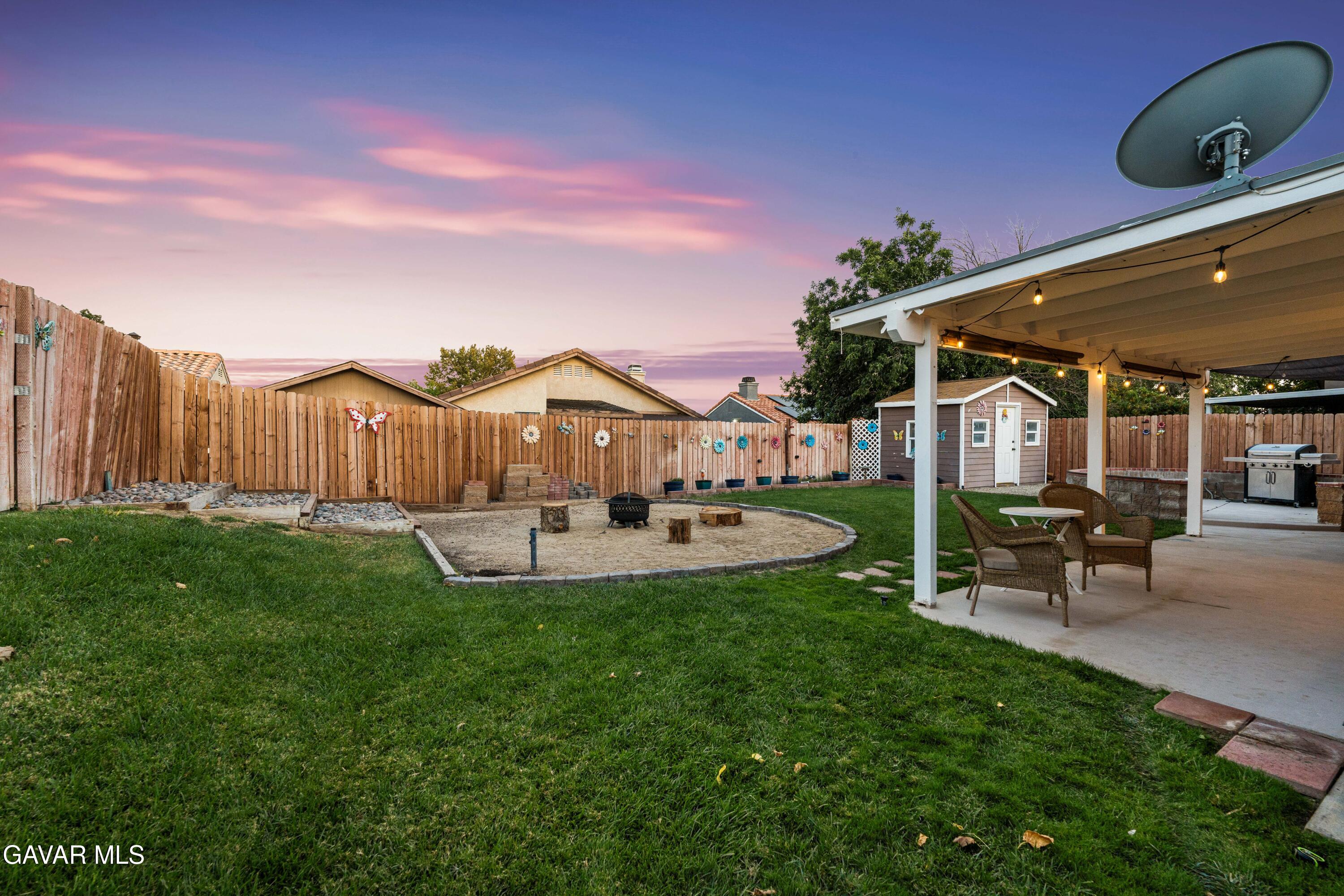 3418 Rodney Street Rosamond, CA 93560 - Photo 35 of 35 a view of a house with backyard and sitting area