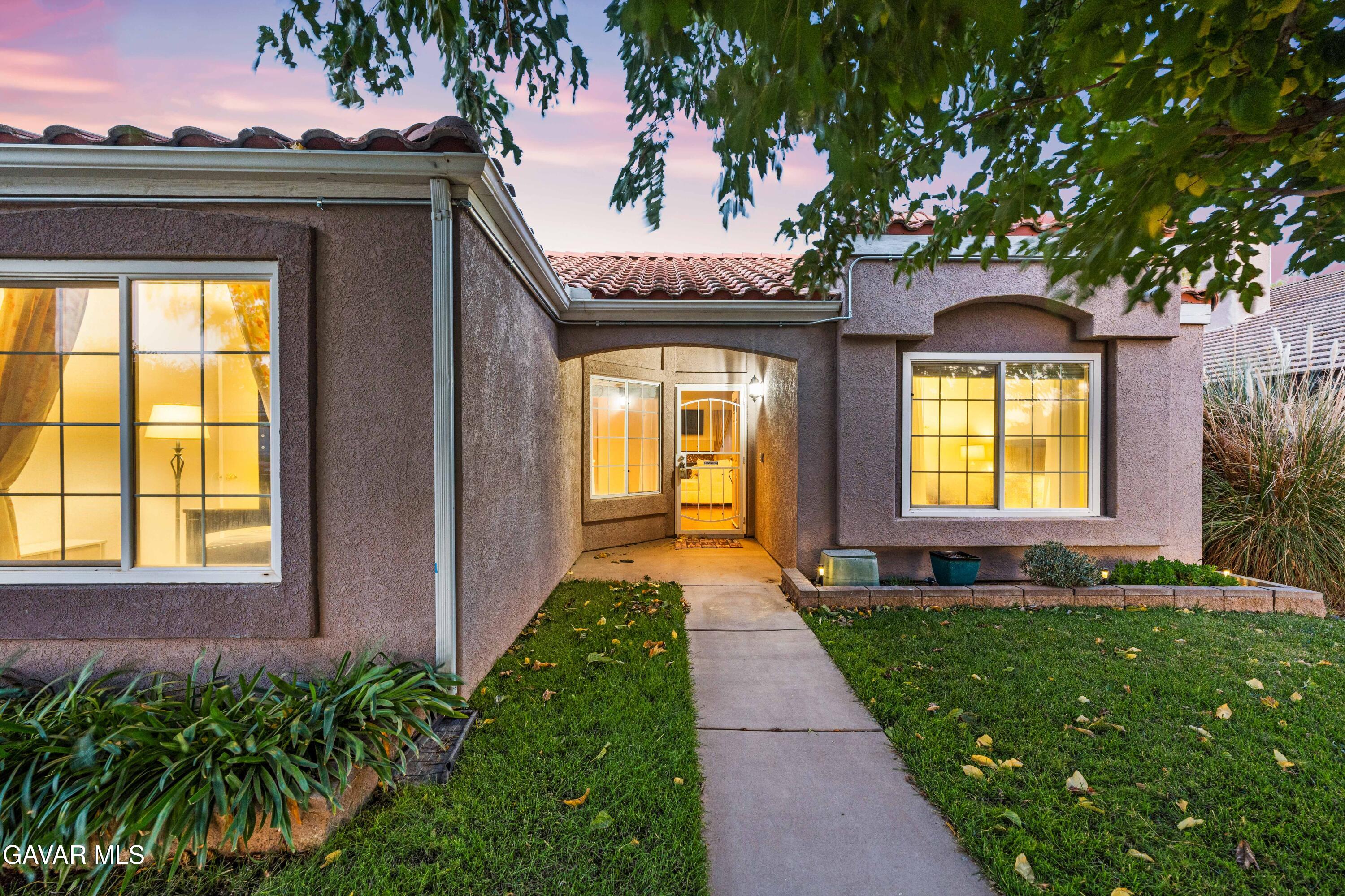 3418 Rodney Street Rosamond, CA 93560 - Photo 4 of 35 a front view of a house with a yard