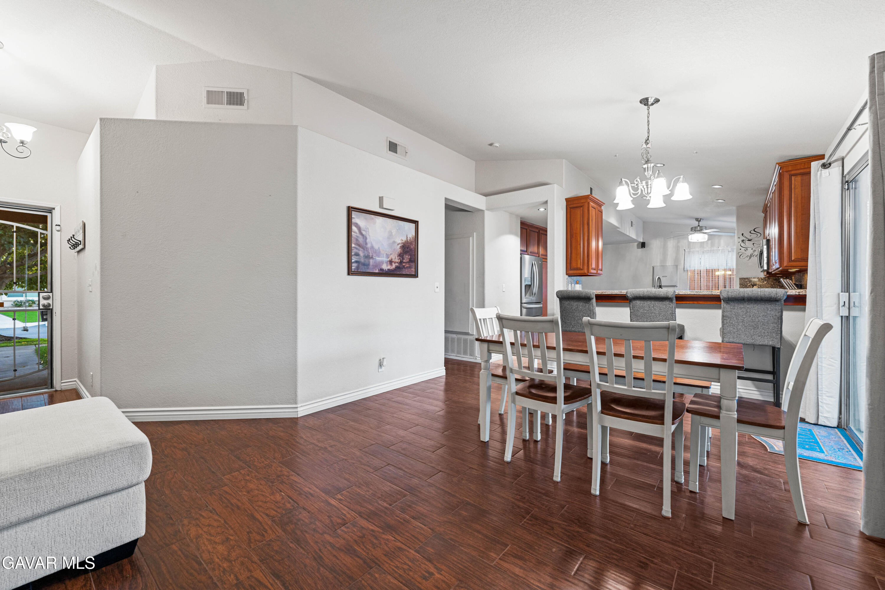 3418 Rodney Street Rosamond, CA 93560 - Photo 6 of 35 a view of a dining room with furniture window and wooden floor