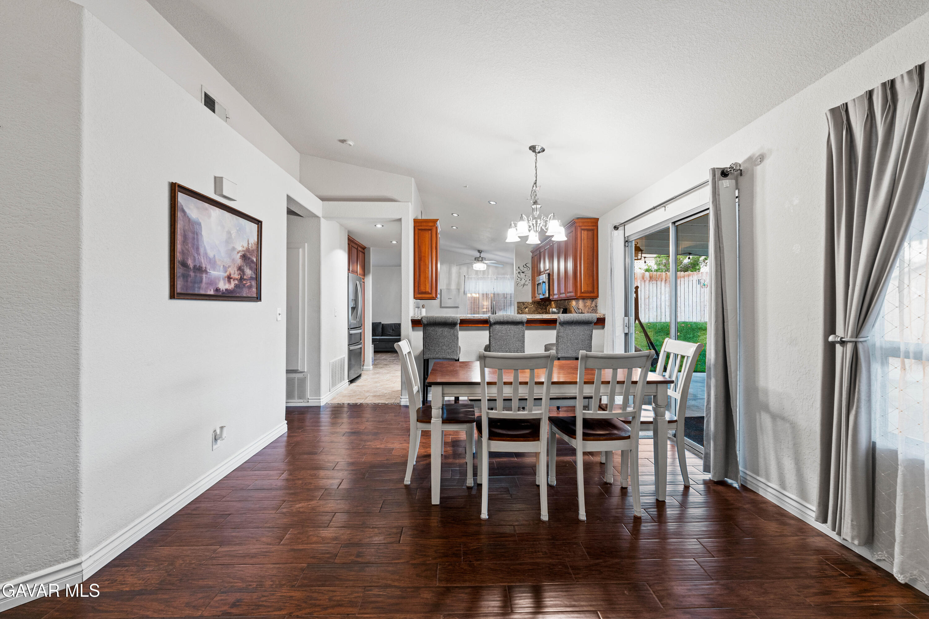 3418 Rodney Street Rosamond, CA 93560 - Photo 8 of 35 a view of a dining room with furniture window and wooden floor