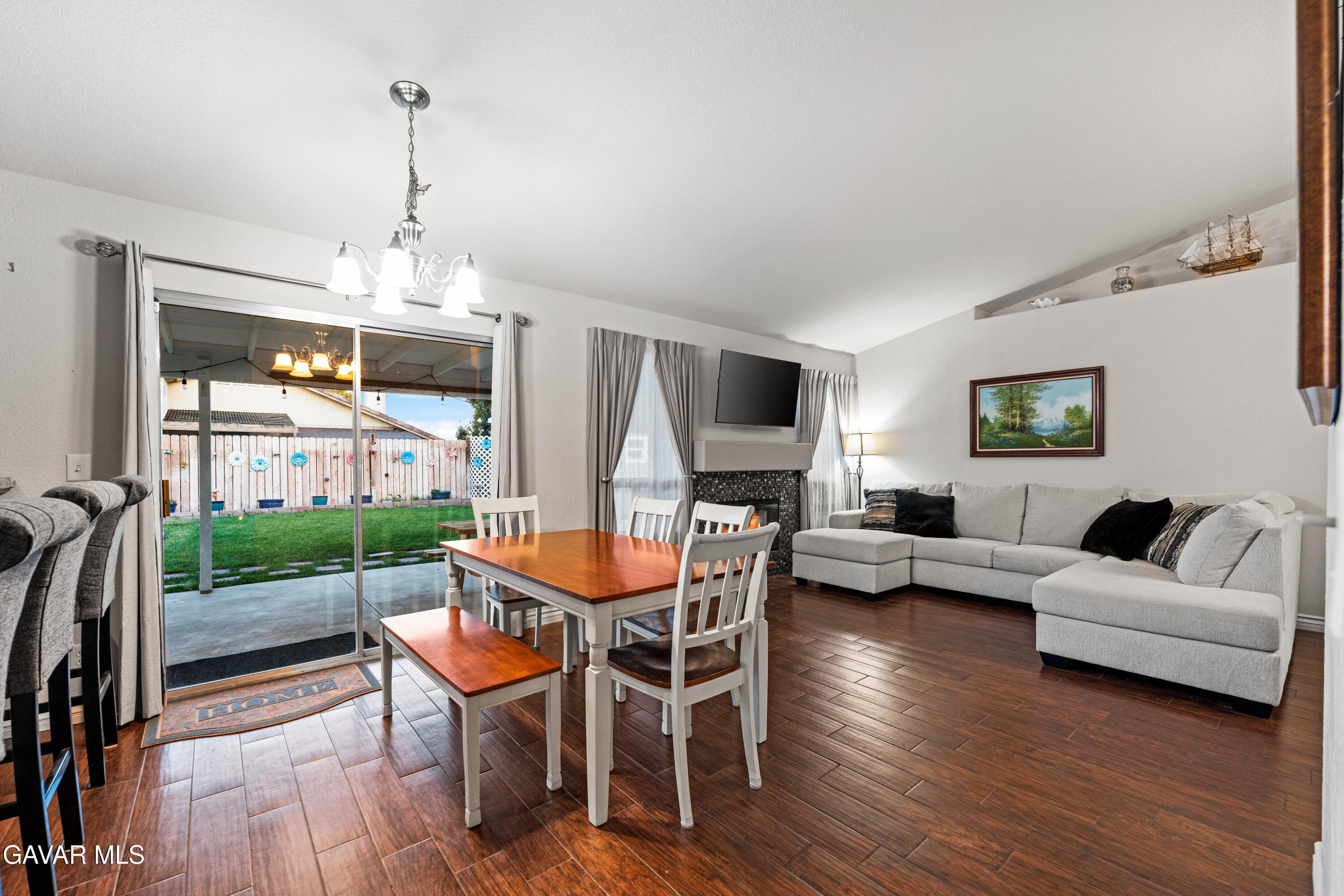 3418 Rodney Street Rosamond, CA 93560 - Photo 10 of 35 a outdoor living space with furniture a flat screen tv and a window