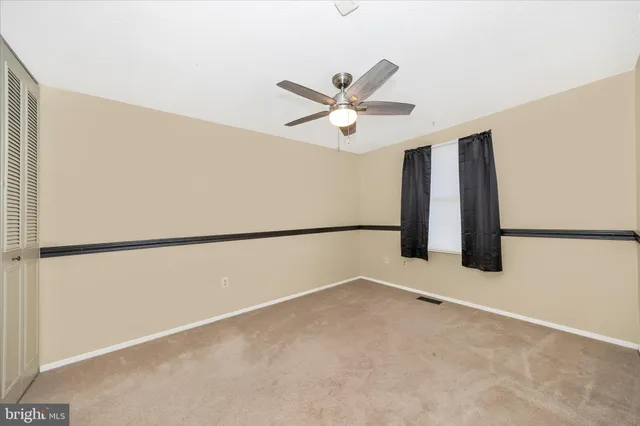a view of a house with outdoor space and sitting area