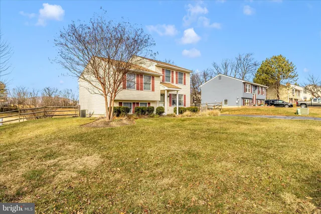 a bedroom with a bed and a walk in closet
