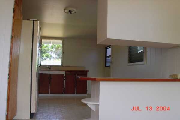 4828 Iiwi Road Kapaa, HI 96746 - Photo 3 of 6 a bathroom with a sink and a mirror