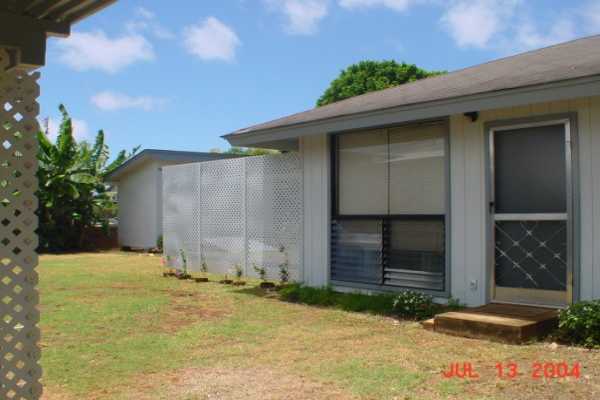 4828 Iiwi Road Kapaa, HI 96746 - Photo 5 of 6 a backyard of a house