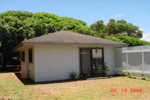 4828 Iiwi Road Kapaa, HI 96746 - Photo 6 of 6 a view of house with yard and trees in the background