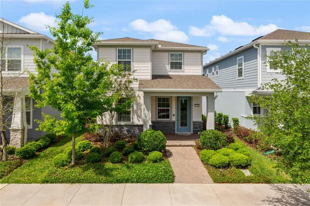 a view of front a house with a yard