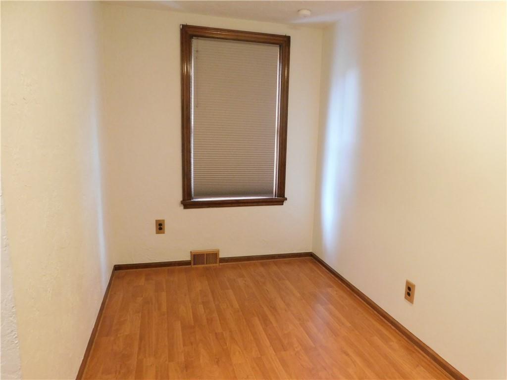 526 Agnew Road Pittsburgh, PA 15227 - Photo 24 of 25 a view of a small space with wooden floor and a window