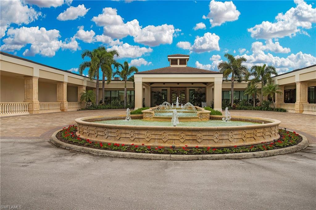 96 Silver Oaks Circle, Unit 1202 Naples, FL 34119 - Photo 26 of 30 a view of a house with a fountain