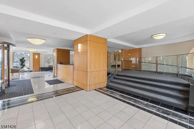 a view of lobby with a mirror