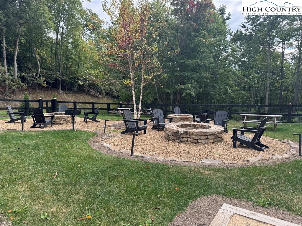 Bear Paw Road Elk Park, NC 28622 - Photo 14 of 19 a view of a park with bench and a bench