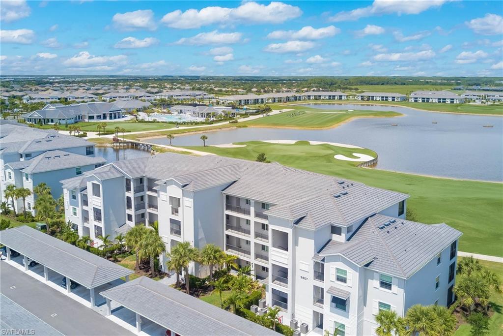 5807 Double Eagle Cir Avenue, Unit 4635 Immokalee, FL 34142 - Photo 31 of 43 a view of a city with an ocean view