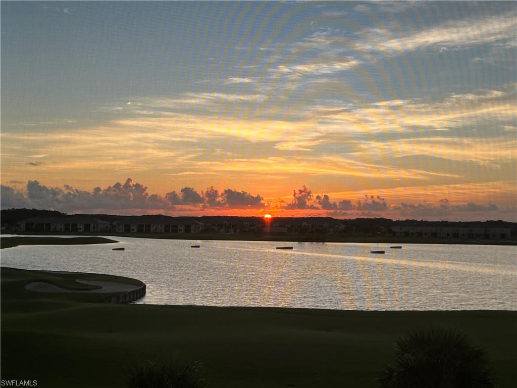 5807 Double Eagle Cir Avenue, Unit 4635 Immokalee, FL 34142 - Photo 39 of 43 a view of an ocean and a mountain