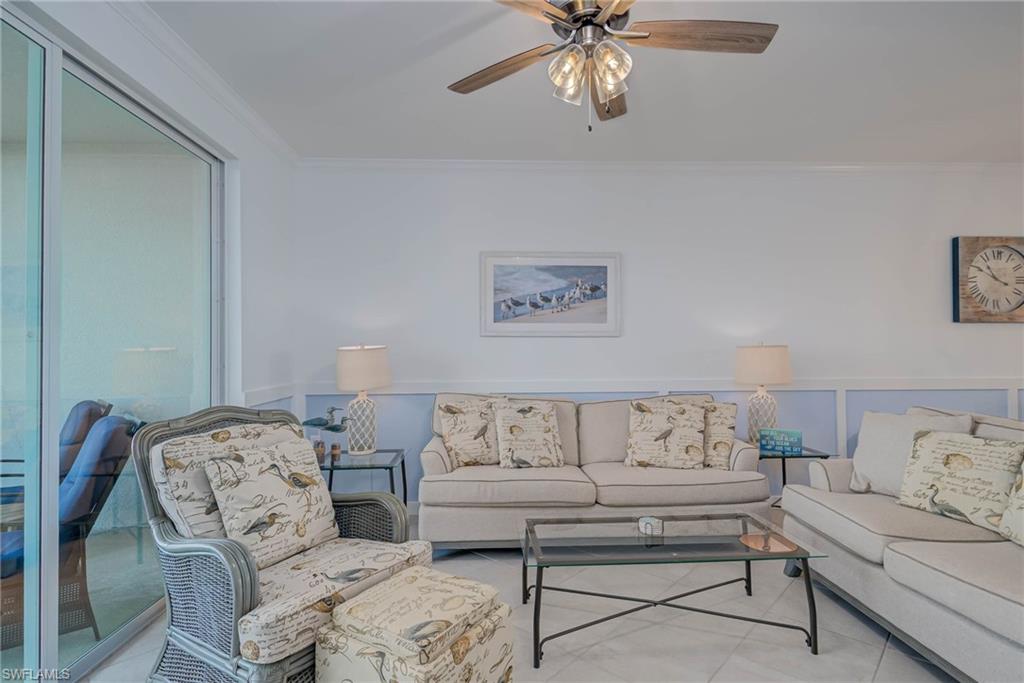 5807 Double Eagle Cir Avenue, Unit 4635 Immokalee, FL 34142 - Photo 7 of 43 a bedroom with furniture and a chandelier