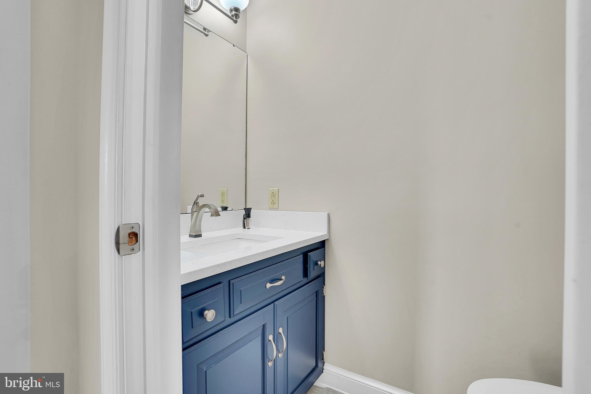13039 Spickler Road Clear Spring, MD 21722 - Photo 16 of 59 a bathroom with a sink and a mirror