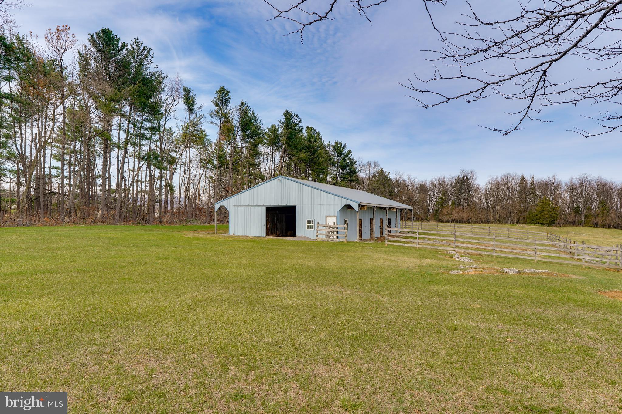 13039 Spickler Road Clear Spring, MD 21722 - Photo 39 of 59 a front view of house with yard and trees