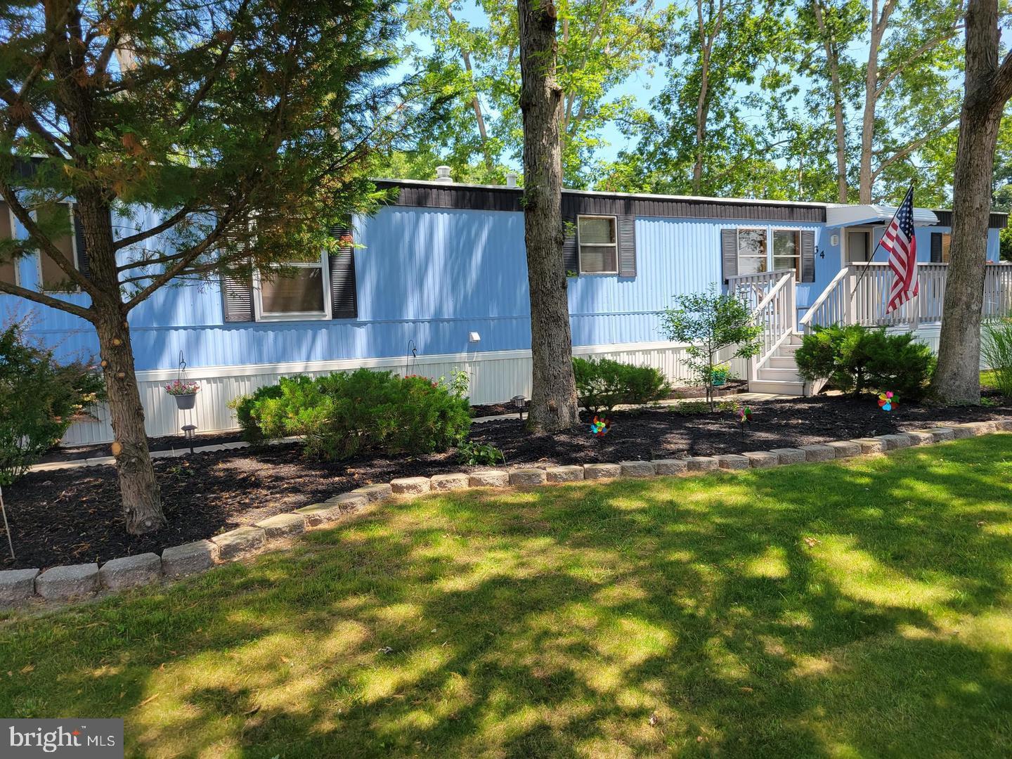 a house view with a garden space