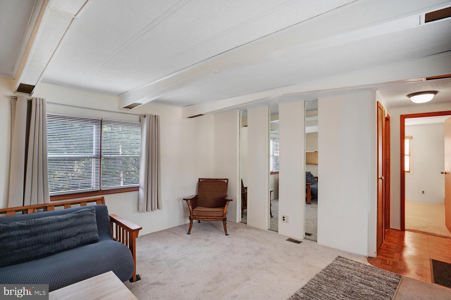 34 Holly Road West Creek, NJ 08092 - Photo 11 of 28 a living room with furniture and a window