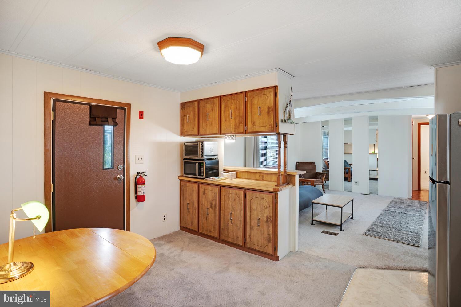 34 Holly Road West Creek, NJ 08092 - Photo 17 of 28 a view of kitchen with furniture and window
